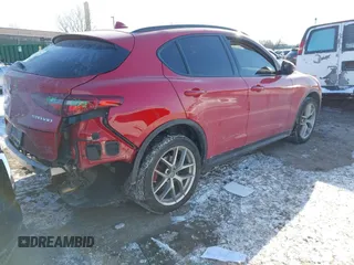 2019 Alfa Romeo Stelvio z VIN ZASPAKAN9K7C49108, wystawiony jako IAAI lot #41365234 z przebiegiem 53 196 mil mil oraz . Historia ofert i sprzedaży dostępna na DreamBid. Obrazek 4.
