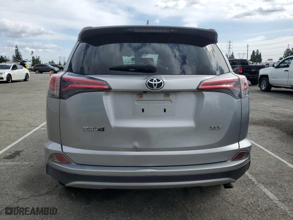 2018 Toyota RAV4 XLE with VIN JTMWFREV9JJ200730, listed as a Copart auction lot 51503665 with 98,855 mi miles and Salvage Title. Bid and sale history available at carsss.com. Image 6.