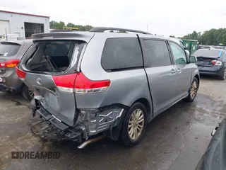 2012 Toyota Sienna XLE AAS with VIN 5TDYK3DC6CS243008, listed as a IAAI auction lot 40351580 with 157,752 mi miles and . Bid and sale history available at DreamBid. Image 4.