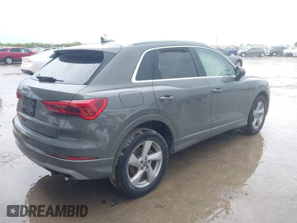 2020 Audi Q3 Premium z VIN WA1AECF30L1052472, wystawiony jako IAAI lot #41886809 z przebiegiem 101 600 mil mil oraz . Historia ofert i sprzedaży dostępna na DreamBid. Obrazek 4.