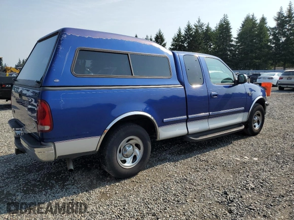 1998 Ford F-150 with VIN 1FTZX1765WKA33379, listed as a Copart auction lot 62009135 with 152,607 mi miles and Salvage title. Bid and sale history available at DreamBid. Image 3.