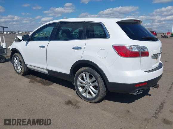 2011 Mazda CX-9 Grand Touring with VIN JM3TB3DA0B0311353, listed as a IAAI auction lot 42085234 with 156,578 mi miles and . Bid and sale history available at DreamBid. Image 3.