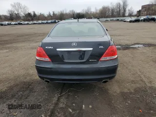 2006 Acura RL with VIN JH4KB16576C003138, listed as a Copart auction lot 52933995 with 176,906 mi miles and Salvage Title. Bid and sale history available at DreamBid. Image 6.