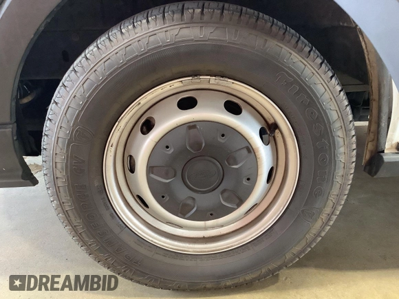 2019 Ford Transit with VIN 1FTYE1YM4KKB86909, listed as a IAAI auction lot 42749952 with 113,691 mi miles and . Bid and sale history available at DreamBid. Image 13.