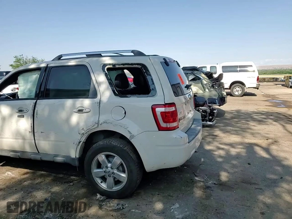 2010 Ford Escape Limited with VIN 1FMCU9EG5AKD32965, listed as a Copart auction lot 59765695 with Not provided miles and Salvage title. Bid and sale history available at DreamBid. Image 14.