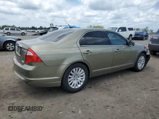 2012 Ford Fusion Hybrid z VIN 3FADP0L33CR210203, wystawiony jako Copart lot #59774345 z przebiegiem 132 152 mil mil oraz Szkoda całkowita • Salvage title. Historia ofert i sprzedaży dostępna na DreamBid. Obrazek 3.