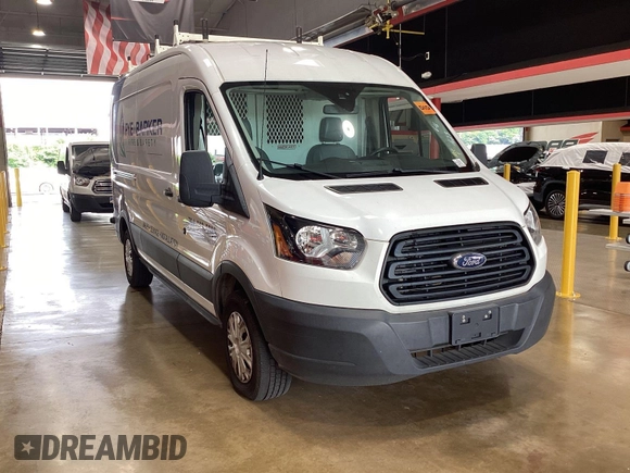 2019 Ford Transit z VIN 1FTYR2CM1KKA32062, wystawiony jako IAAI lot #42596475 z przebiegiem 151 369 mil mil oraz . Historia ofert i sprzedaży dostępna na DreamBid. Obrazek 19.