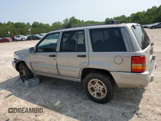 1998 Jeep Grand Cherokee Limited with VIN 1J4GZ78Y5WC324828, listed as a Copart auction lot 58992125 with 225,705 mi miles and Salvage title. Bid and sale history available at DreamBid. Image 2.
