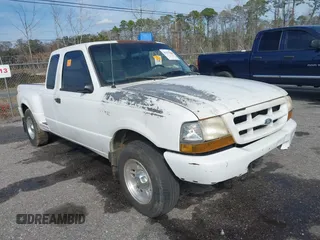 1999 Ford Ranger XLT with VIN 1FTYR14X1XTA56091, listed as a IAAI auction lot 41437904 with 187,149 mi miles and . Bid and sale history available at DreamBid. Image 1.