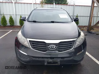 2011 Kia Sportage LX with VIN KNDPB3A26B7100916, listed as a IAAI auction lot 41939760 with 205,890 mi miles and . Bid and sale history available at carsss.com. Image 6.