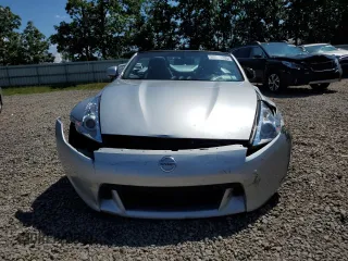 2012 Nissan 370Z Touring with VIN JN1AZ4FH3CM370910, listed as a Copart auction lot 65940005 with 23,009 mi miles and Salvage title. Bid and sale history available at DreamBid. Image 5.