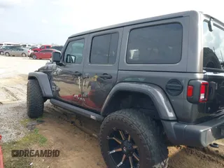 2019 Jeep Wrangler Unlimited Sahara with VIN 1C4HJXEG7KW661801, listed as a IAAI auction lot 40848731 with Not provided miles and . Bid and sale history available at DreamBid. Image 13.
