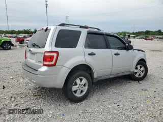 2009 Ford Escape XLS z VIN 1FMCU92789KB10338, wystawiony jako Copart lot #57452495 z przebiegiem 285 171 mil mil oraz Szkoda całkowita • Salvage title. Historia ofert i sprzedaży dostępna na DreamBid. Obrazek 3.