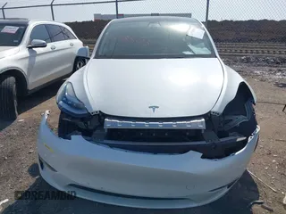 2022 Tesla Model Y Long Range with VIN 7SAYGDEE4NF428434, listed as a IAAI auction lot 41578503 with 35,460 mi miles and . Bid and sale history available at DreamBid. Image 12.