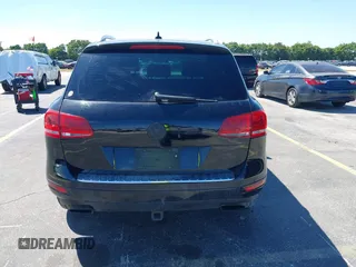 2013 Volkswagen Touareg Lux with VIN WVGEF9BP6DD004454, listed as a IAAI auction lot 41862958 with 239,548 mi miles and . Bid and sale history available at DreamBid. Image 16.