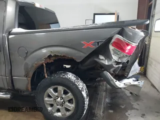2011 Ford F-150 XLT with VIN 1FTFW1ET4BFB50467, listed as a IAAI auction lot 41608114 with 201,858 mi miles. Bid and sale history available at carsss.com. Image 6.