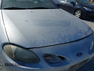 2001 Ford Escort ZX2 with VIN 3FAFP11321R241862, listed as a IAAI auction lot 41875706 with 284,720 mi miles. Bid and sale history available at carsss.com. Image 15.