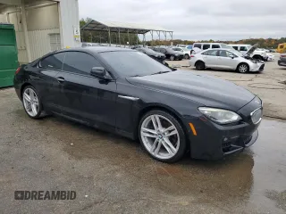 2014 BMW 6 Series 650i with VIN WBAYM9C53ED248159, listed as a Copart auction lot 79023474 with 147,889 mi miles and Clean Title. Bid and sale history available at carsss.com. Image 4.