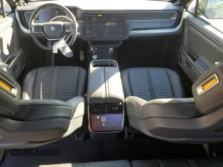 2023 Rivian R1T Adventure with VIN 7FCTGAAA7PN024633, listed as a Copart auction lot 41481365 with 24,965 mi miles and Salvage Title. Bid and sale history available at carsss.com. Image 8.
