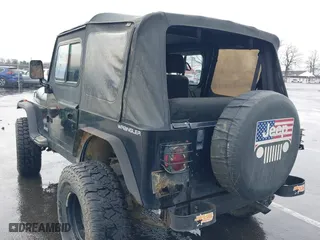 1995 Jeep Wrangler S with VIN 1J4FY19P0SP258399, listed as a IAAI auction lot 41970320 with 151,621 mi miles. Bid and sale history available at carsss.com. Image 3.