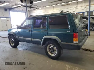 1997 Jeep Cherokee SE with VIN 1J4FJ28S0VL551442, listed as a Copart auction lot 49215195 with 164,356 mi miles and Salvage Title. Bid and sale history available at carsss.com. Image 2.