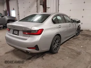 2019 BMW 3 Series 330i xDrive with VIN WBA5R7C53KAJ86493, listed as a IAAI auction lot 41559974 with 55,391 mi miles. Bid and sale history available at carsss.com. Image 4.