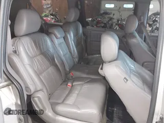 2010 Honda Odyssey EX-L z VIN 5FNRL3H75AB009698, wystawiony jako IAAI lot #42855966 z przebiegiem 215 138 mil mil oraz . Historia ofert i sprzedaży dostępna na DreamBid. Obrazek 8.