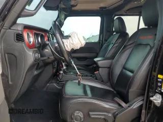 2020 Jeep Gladiator Rubicon with VIN 1C6JJTBG2LL166964, listed as a Copart auction lot 58041945 with 62,716 mi miles and Salvage title. Bid and sale history available at DreamBid. Image 7.
