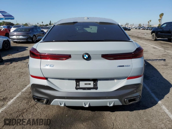 2025 BMW X6 xDrive40i with VIN 5UX33EX07S9Y53337, listed as a Copart auction lot 46340085 with 1,609 mi miles and Salvage Title. Bid and sale history available at carsss.com. Image 6.