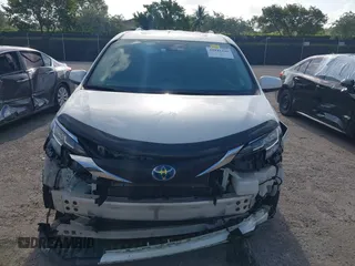 2021 Toyota Sienna XLE with VIN 5TDYRKEC7MS017968, listed as a IAAI auction lot 42145440 with 85,989 mi miles and . Bid and sale history available at DreamBid. Image 13.