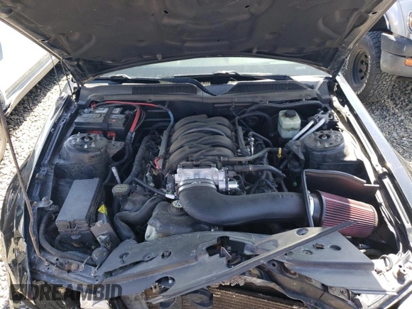 2006 Ford Mustang GT Deluxe z VIN 1ZVFT82H765214771, wystawiony jako Copart lot #56602605 z przebiegiem 125 315 mil mil oraz Szkoda całkowita • Salvage title. Historia ofert i sprzedaży dostępna na DreamBid. Obrazek 11.