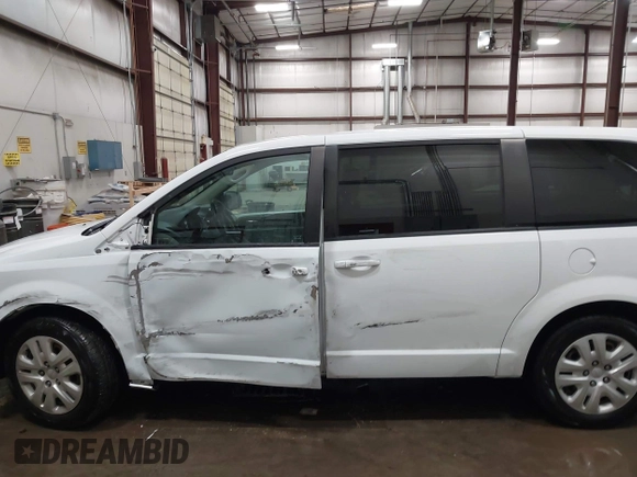 2018 Dodge Grand Caravan SE with VIN 2C4RDGBG5JR190786, listed as a IAAI auction lot 41603163 with 102,351 mi miles and . Bid and sale history available at DreamBid. Image 14.