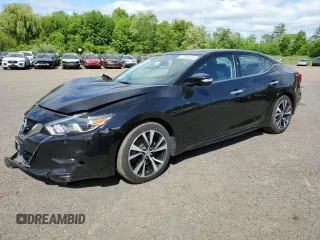 2018 Nissan Maxima SV z VIN 1N4AA6AP6JC401283, wystawiony jako Copart lot #57285845 z przebiegiem 71 717 mil mil oraz Czysty tytuł • Clean title. Historia ofert i sprzedaży dostępna na DreamBid. Obrazek 1.