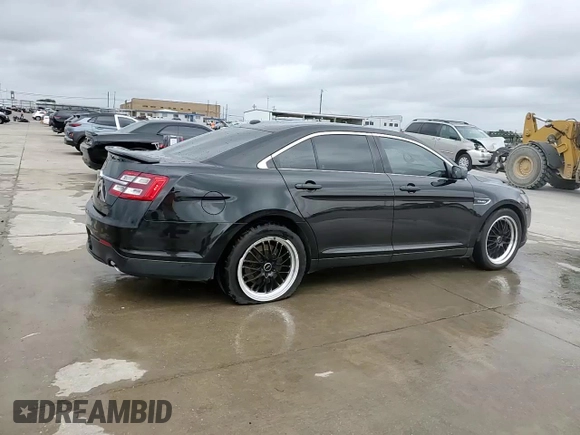 2014 Ford Taurus SHO z VIN 1FAHP2KT4EG106957, wystawiony jako Copart lot #59364185 z przebiegiem 113 704 mil mil oraz Szkoda całkowita • Salvage title. Historia ofert i sprzedaży dostępna na DreamBid. Obrazek 13.