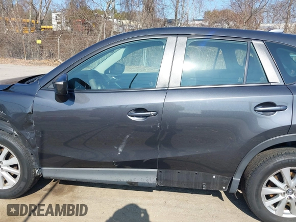 2015 Mazda CX-5 Sport with VIN JM3KE4BY1F0526755, listed as a IAAI auction lot 41768916 with 197,675 mi miles. Bid and sale history available at carsss.com. Image 14.