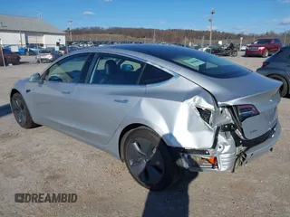 2018 Tesla Model 3 Long Range Battery with VIN 5YJ3E1EB9JF065057, listed as a IAAI auction lot 41863903 with 54,584 mi miles and . Bid and sale history available at DreamBid. Image 3.