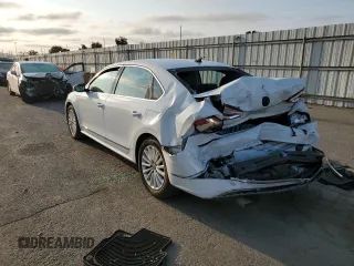 2016 Volkswagen Passat SE с VIN 1VWBT7A37GC020690, выставлен на аукционе Copart как лот 65091314 с пробегом 89 027 миль миль и Списание • Salvage title. История ставок и продаж доступна на DreamBid. Изображение 2.