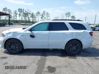 2023 Dodge Durango R/T Plus with VIN 1C4SDJCT9PC618774, listed as a IAAI auction lot 41729970 with 18,174 mi miles and . Bid and sale history available at DreamBid. Image 14.