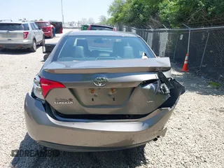 2019 Toyota Corolla L z VIN 5YFBURHE5KP861233, wystawiony jako IAAI lot #42388008 z przebiegiem 131 243 mil mil oraz . Historia ofert i sprzedaży dostępna na DreamBid. Obrazek 16.