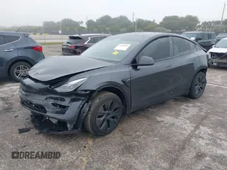2024 Tesla Model Y with VIN 7SAYGDED8RF213927, listed as a IAAI auction lot 41386687 with 3,599 mi miles and . Bid and sale history available at DreamBid. Image 17.