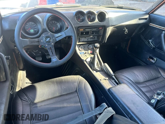 1978 Datsun 280ZX z VIN HLS30422351, wystawiony jako Copart lot #82871604 z przebiegiem 63 110 mil mil oraz Tytuł czysty. Historia ofert i sprzedaży dostępna na DreamBid. Obrazek 6.