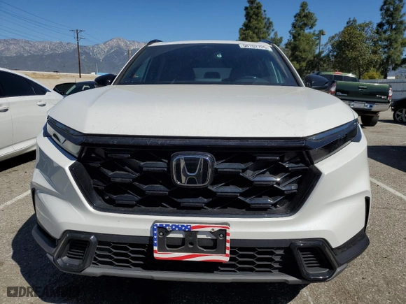 2023 Honda CR-V Hybrid Sport with VIN 2HKRS5H52PH705264, listed as a Copart auction lot 50102705 with 33,558 mi miles and Salvage Title. Bid and sale history available at carsss.com. Image 5.