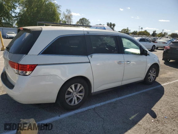 2014 Honda Odyssey EX-L with VIN 5FNRL5H6XEB060557, listed as a Copart auction lot 47141835 with 214,718 mi miles and Clean Title. Bid and sale history available at DreamBid. Image 3.