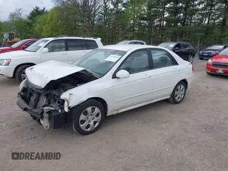 2009 Kia Spectra EX with VIN KNAFE221195609687, listed as a IAAI auction lot 42138825 with 105,170 mi miles. Bid and sale history available at carsss.com. Image 2.