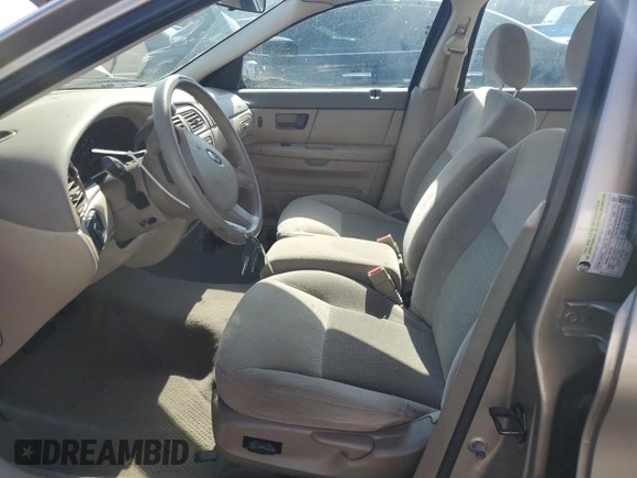 2005 Ford Taurus SE z VIN 1FAFP53215A212736, wystawiony jako Copart lot #58439495 z przebiegiem Nie podano mil oraz Szkoda całkowita • Salvage title. Historia ofert i sprzedaży dostępna na DreamBid. Obrazek 7.