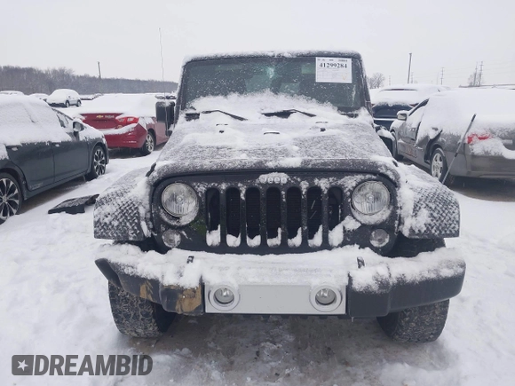 2014 Jeep Wrangler Sahara with VIN 1C4AJWBG3EL190302, listed as a IAAI auction lot 41299284 with 112,476 mi miles and . Bid and sale history available at DreamBid. Image 13.