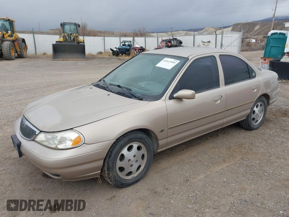 1999 Mercury Mystique GS z VIN 1MEFM6538XK606647, wystawiony jako IAAI lot #41613999 z przebiegiem 90 978 mil mil oraz . Historia ofert i sprzedaży dostępna na DreamBid. Obrazek 2.