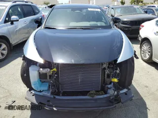 2023 Lexus RZ 450e Premium z VIN JTJAAAAB3PA000731, wystawiony jako Copart lot #57350214 z przebiegiem 7642 mil mil oraz Szkody całkowita. Historia ofert i sprzedaży dostępna na DreamBid. Obrazek 5.