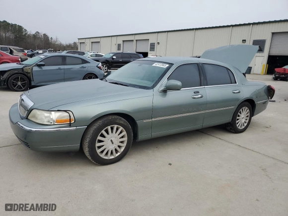 2004 Lincoln Town Car Signature with VIN 1LNHM81W34Y607067, listed as a Copart auction lot 42413965 with 106,973 mi miles and Salvage Title. Bid and sale history available at carsss.com. Image 1.
