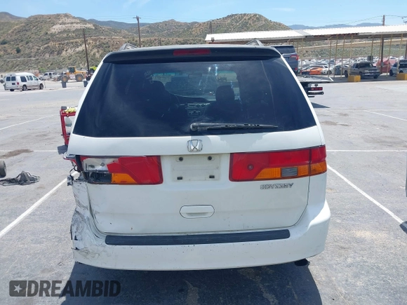 2003 Honda Odyssey EX-L z VIN 5FNRL18033B095684, wystawiony jako IAAI lot #42289617 z przebiegiem 174 336 mil mil oraz . Historia ofert i sprzedaży dostępna na DreamBid. Obrazek 16.